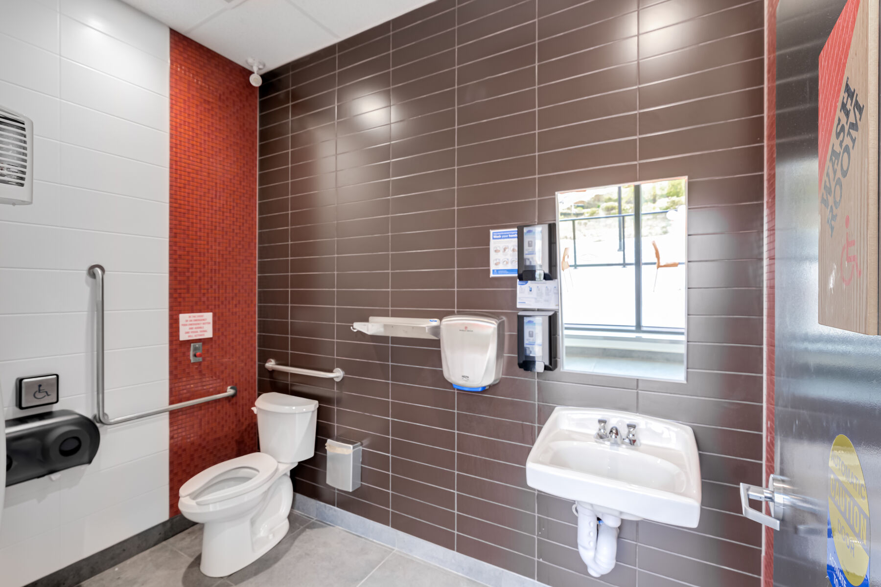 Accessible restaurant washroom with durable finishes