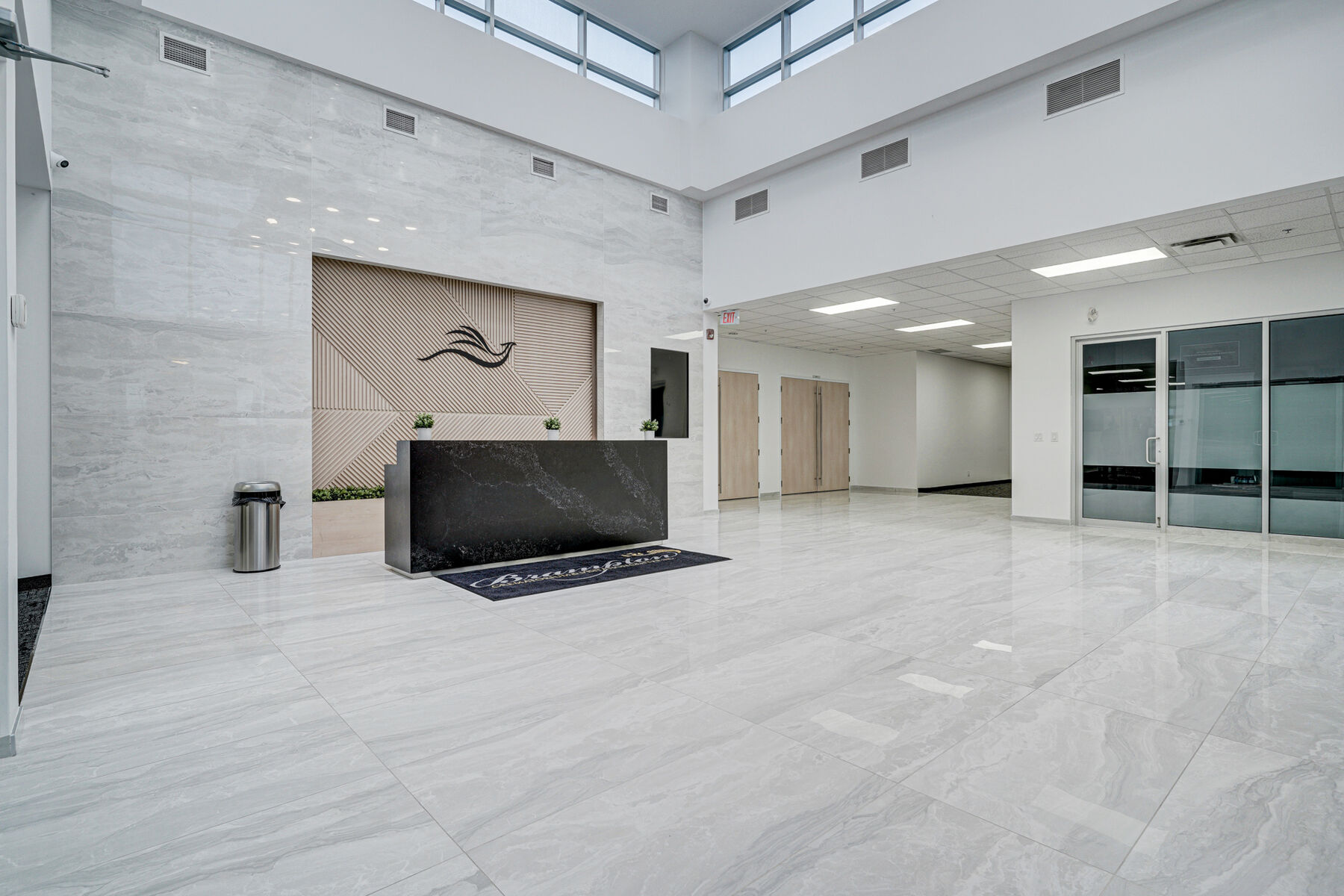 Custom reception desk and architectural feature wall