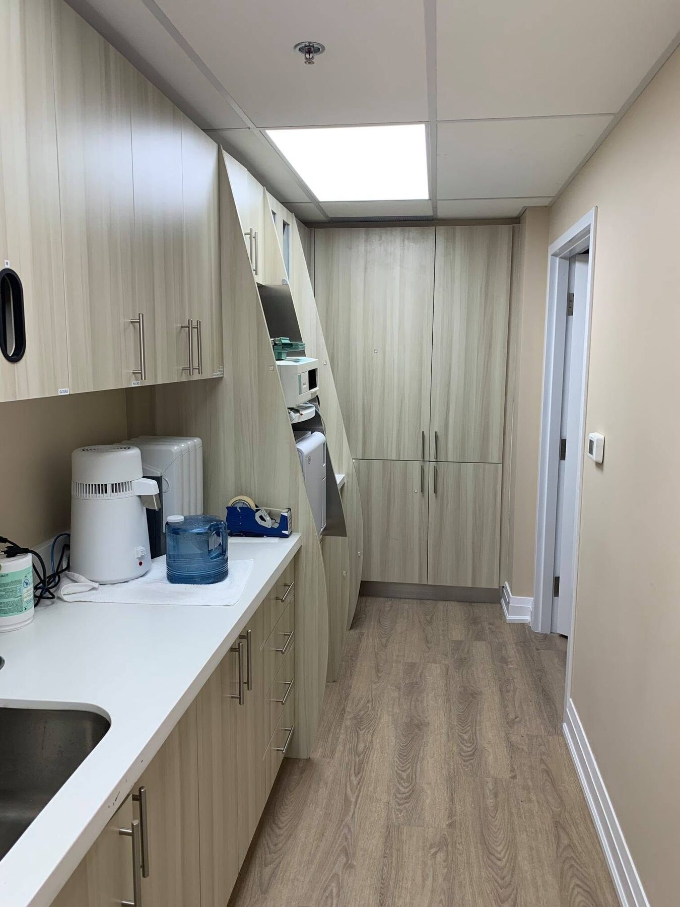 Clinical sterilization area with custom dental cabinetry