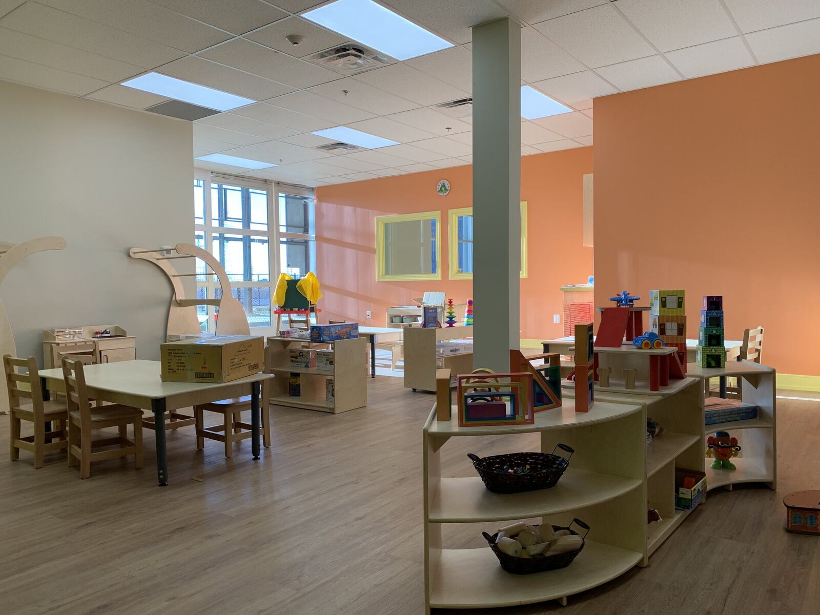 Childcare centre classroom interior with durable flooring and storage