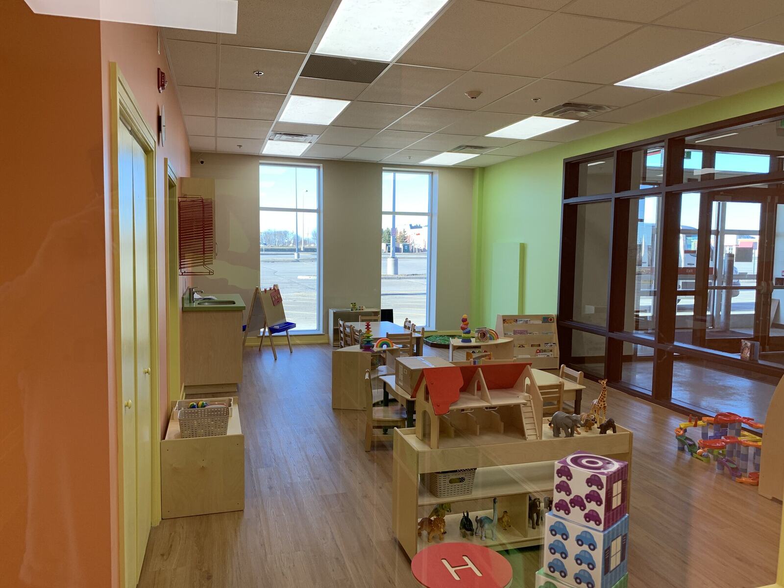 Completed daycare classroom build-out with activity areas and interior glazing